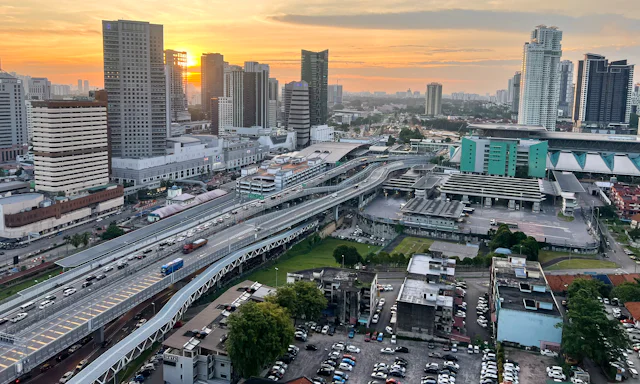 Johor Bahru skyline at sunset, above the border crossing into Singapore